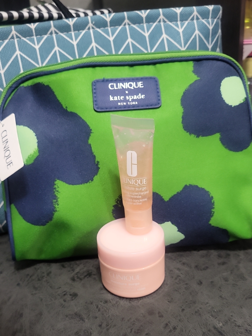 Clinique Green and Navy Floral Cosmetic Pouch with Pink Skincare Duo